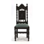 A carved and moulded oak hall chair,