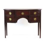 A 19th century mahogany bow-fronted knee-hole sideboard,
