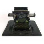 A cased German Gundka Junior Model 3 tinplate typewriter, c.