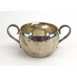 A silver two handled sugar bowl of plain form, maker SB&S Ltd. Birmingham 1935, w. 14 cm, 5.