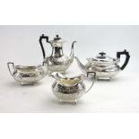 A late Victorian four piece tea service of vase shaped form,