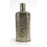 A late Victorian silver and repousse decorated bottle sleeve, makers mark indistinct,