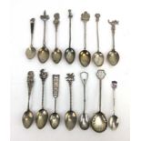 Fourteen silver and metalware souvenir spoons including an example with kiwi end set New Zealand