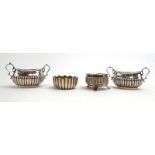 A pair of silver two handled salts of oval form with gadrooned decoration,