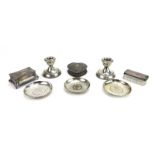 A mixed parcel of silver and metalware including a pair of dwarf candlesticks,