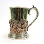 A late 19th/early 20th century silver plated and parcel gilt tankard of imposing proportions,