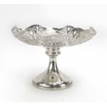 A pierced silver tazza of typical form, maker WA, Birmingham 1935, h. 15 cm, 11.