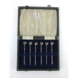 A cased set of six silver picks with cockeral finial's, Adie Brothers Ltd., Birmingham 1960, l. 7.