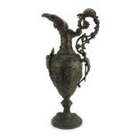 A 19th century copper-finished spelter ewer decorated with masks, h.