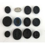 A group of twelve Wedgwood & Bentley and other intaglio cameos,