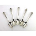 A set of five George III silver old English pattern bright-cut engraved teaspoons, maker TW,