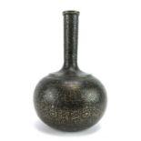 A late 19th century Islamic niellowork bottle vase,