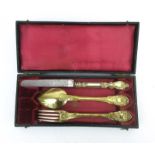 A late 19th/early 20th century cased French silver gilt cutlery set comprising knife,