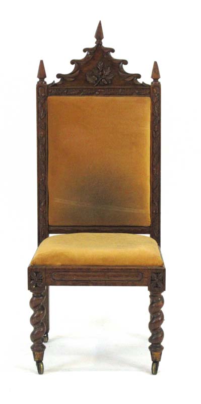 A Victorian oak and upholstered hall chair with a Gothic Revival pediment, - Image 2 of 2