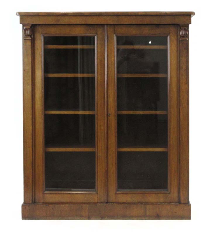 A Victorian walnut bookcase with two glazed doors, on a plinth base, w. - Image 2 of 3
