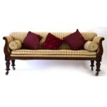 A William IV mahogany and upholstered sofa with scrolled arms,
