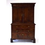 A William & Mary walnut and crossbanded cabinet,