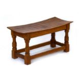 A Robert 'Mouseman' Thompson of Kilburn double dish top stool/table,