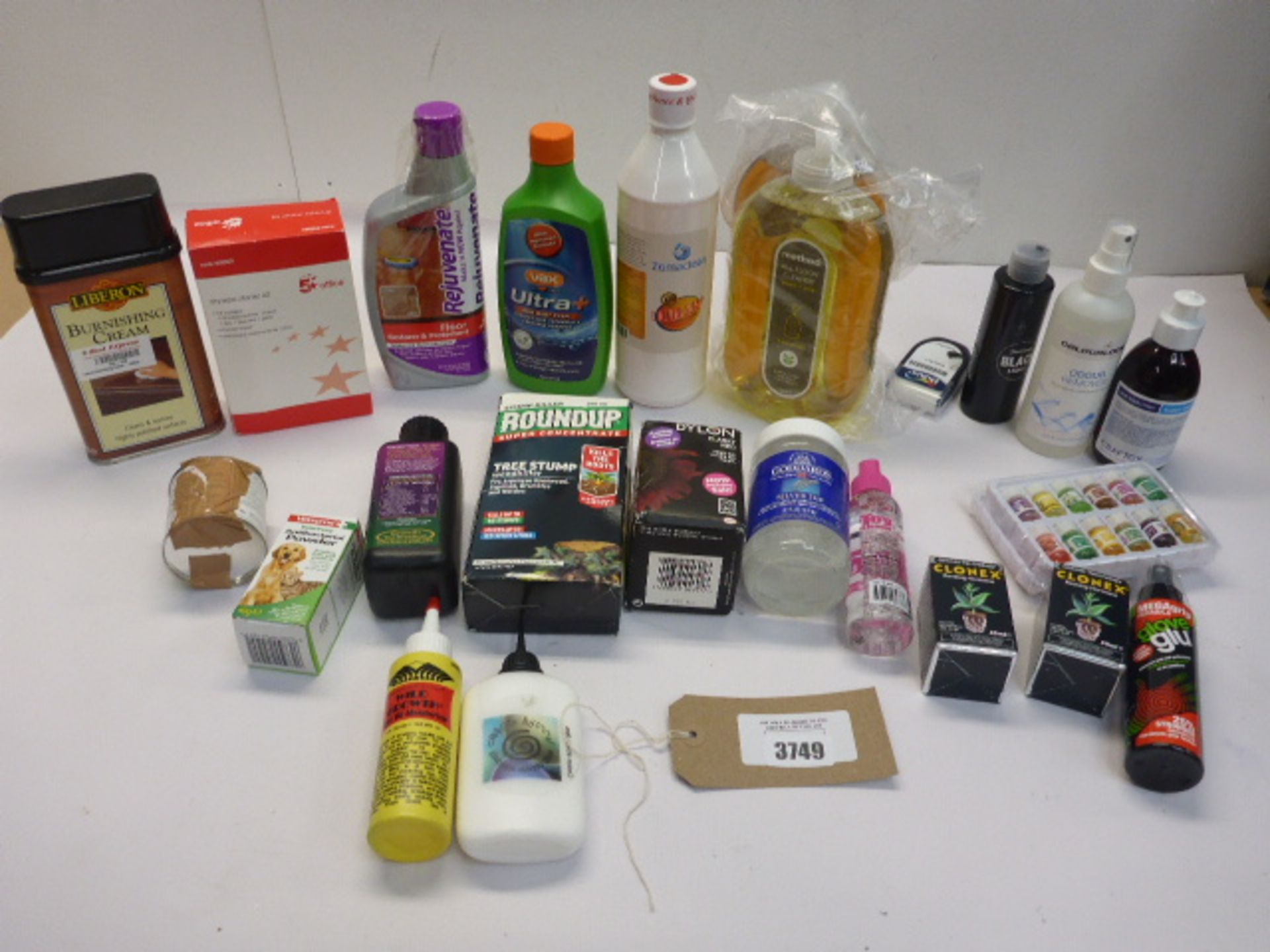 Bag containing household cleaner, odour remover, week killer, drywipe starter kit, dye etc