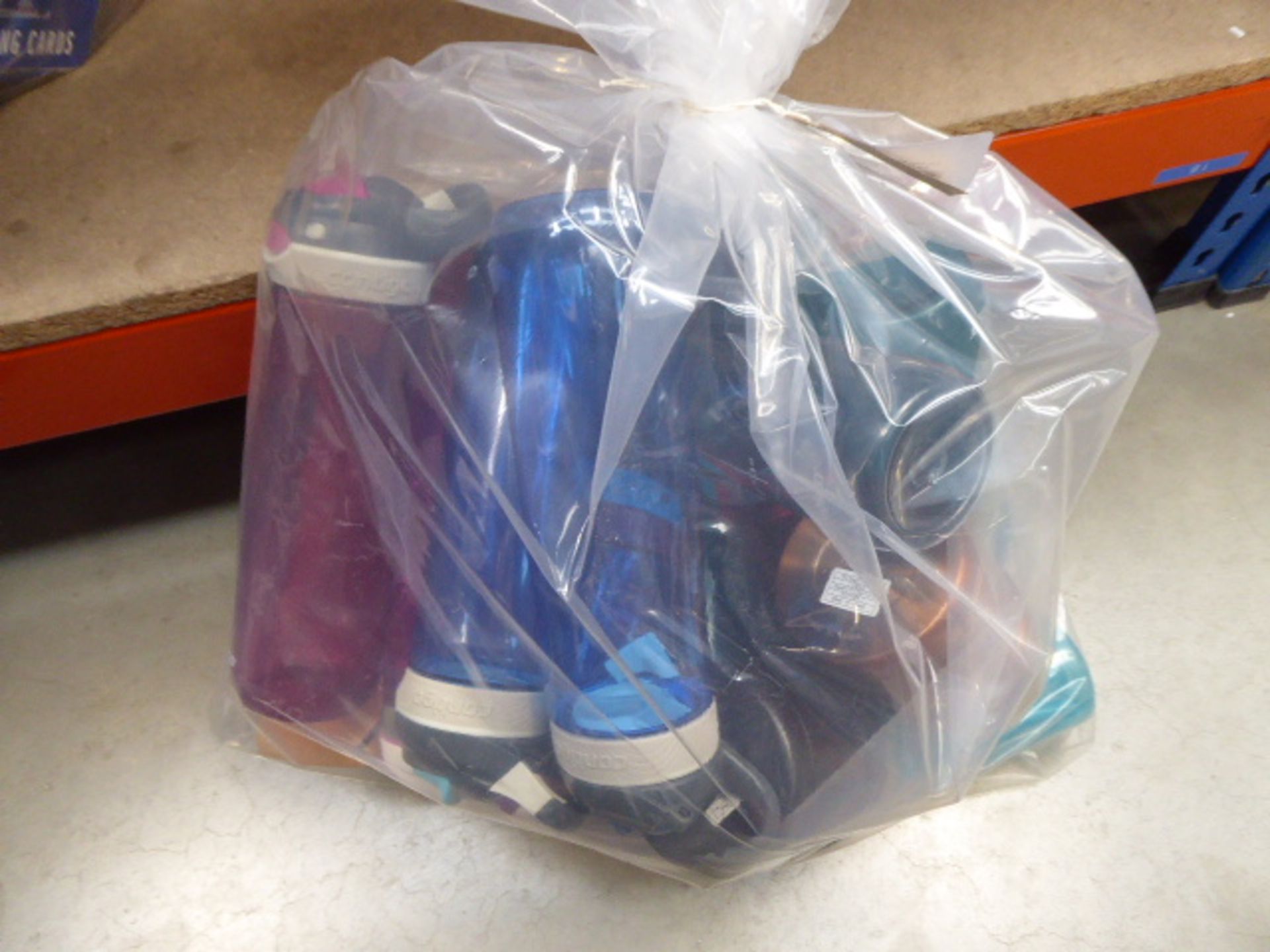 Bag containing a quantity of Conti Negro drinking bottles