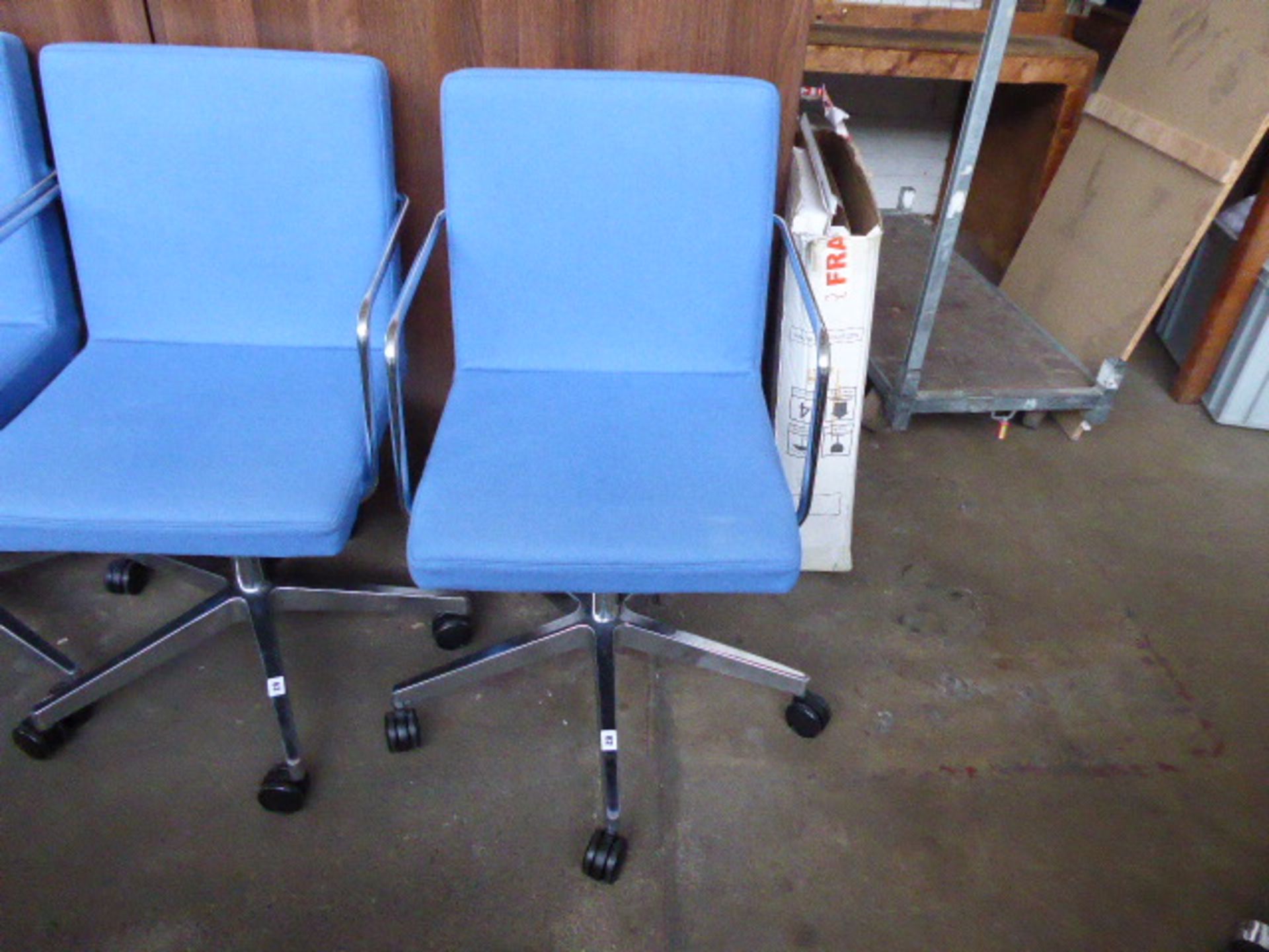 Blue felt cloth and chrome swivel armchair