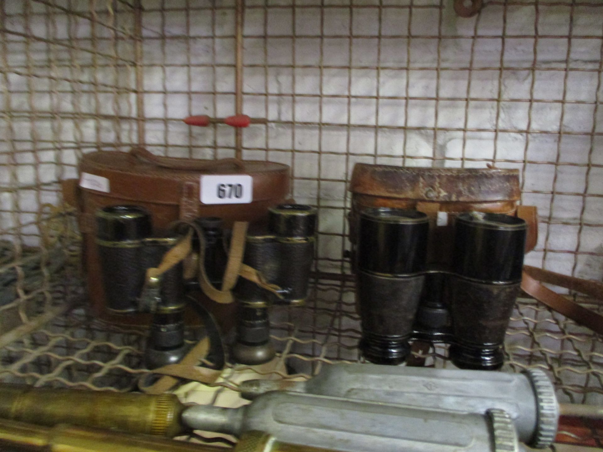 2 leather cased pairs of binoculars and further loose pair of binoculars