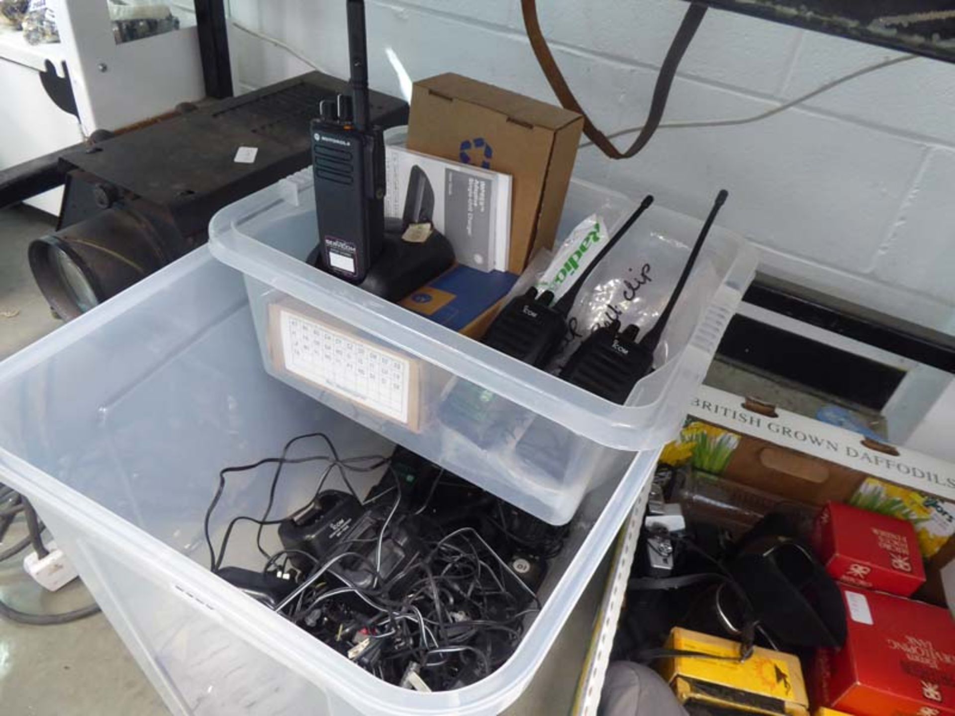 Large crate containing qty of Ikon and Motorola radio handset equipment, chargers, docks,