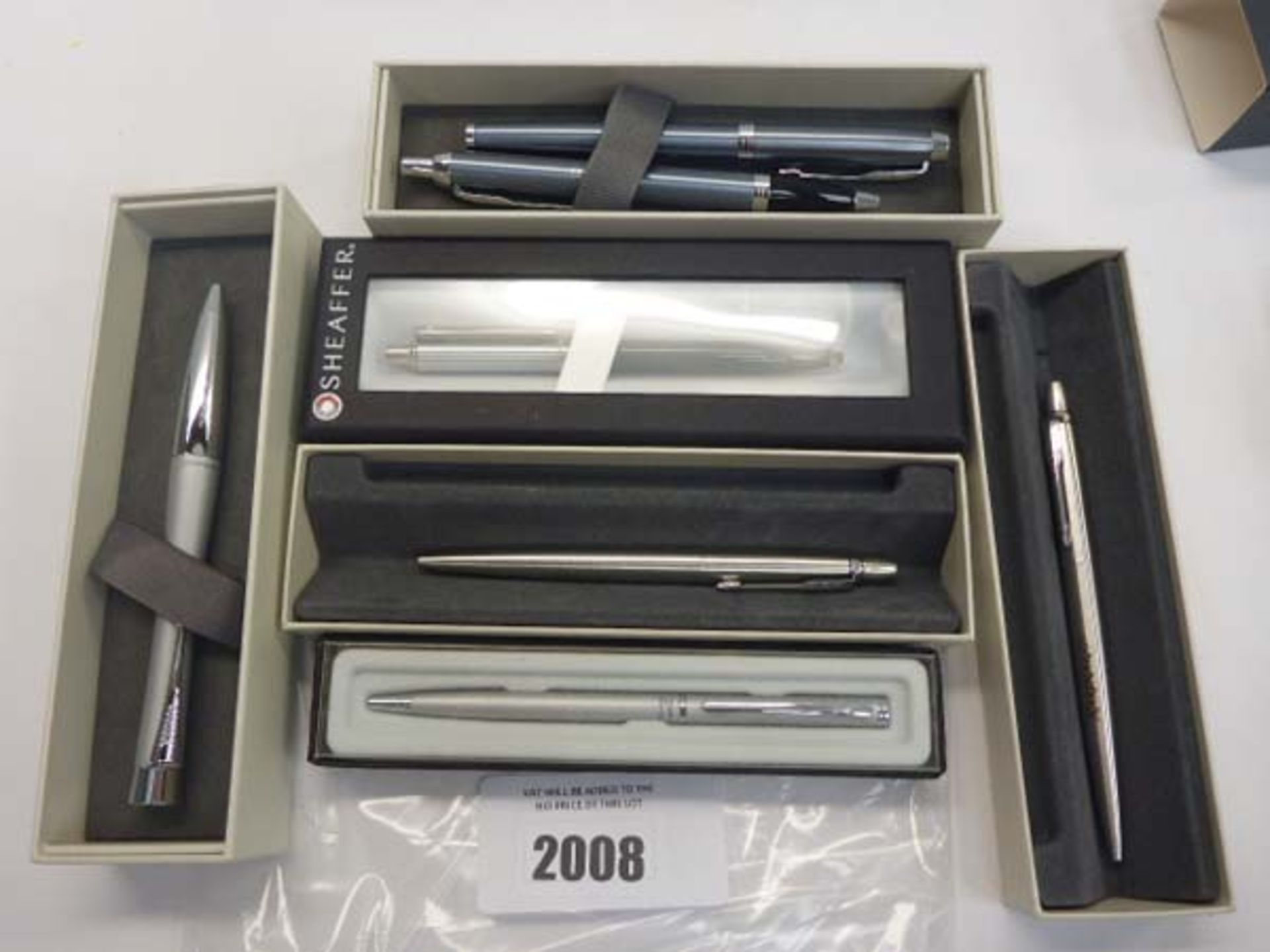 4 Parker ballpoint pents (3 with custom engravings), Sheaffer pen and one other