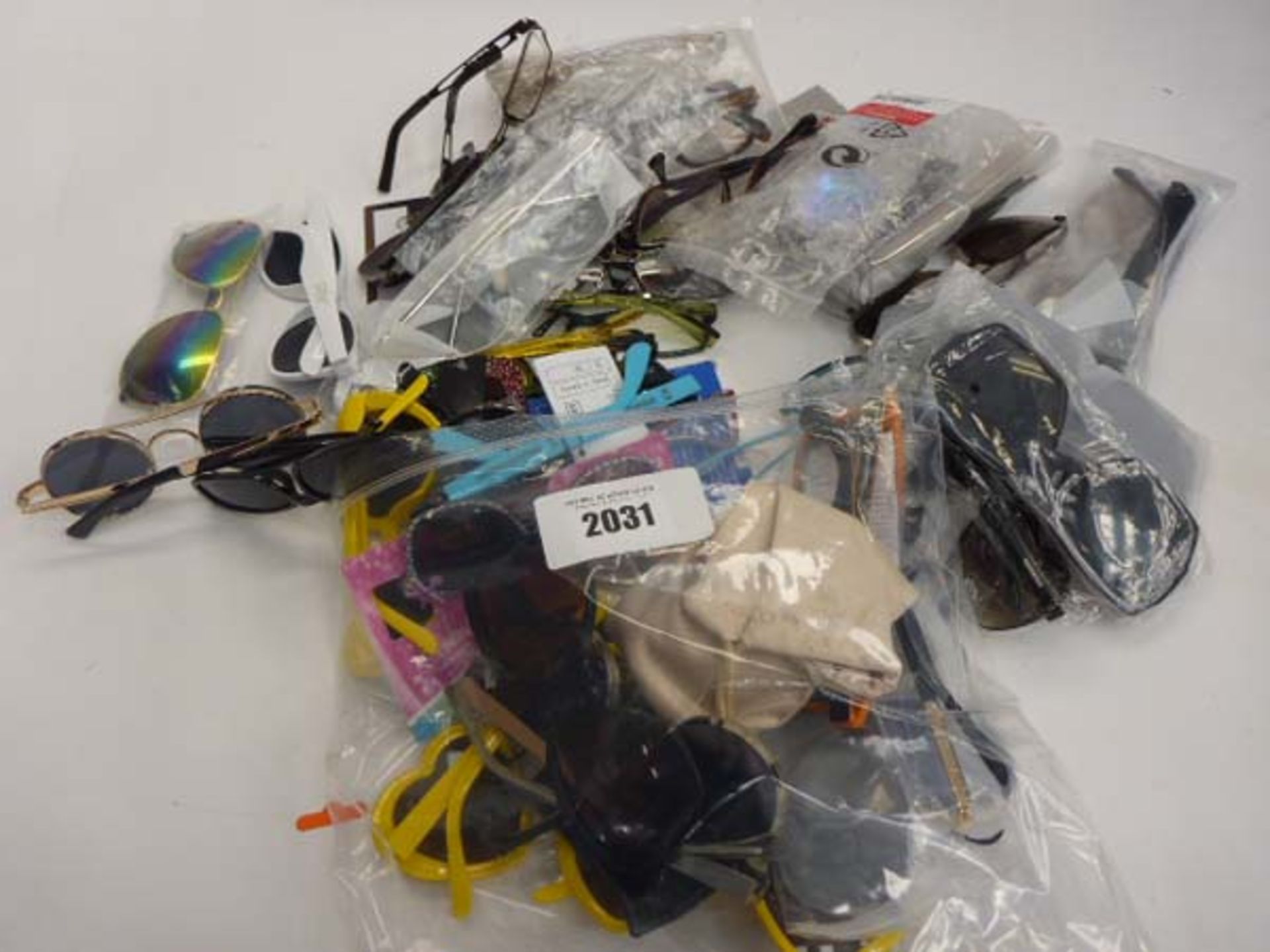 Quantity of various sunglasses and reading glasses