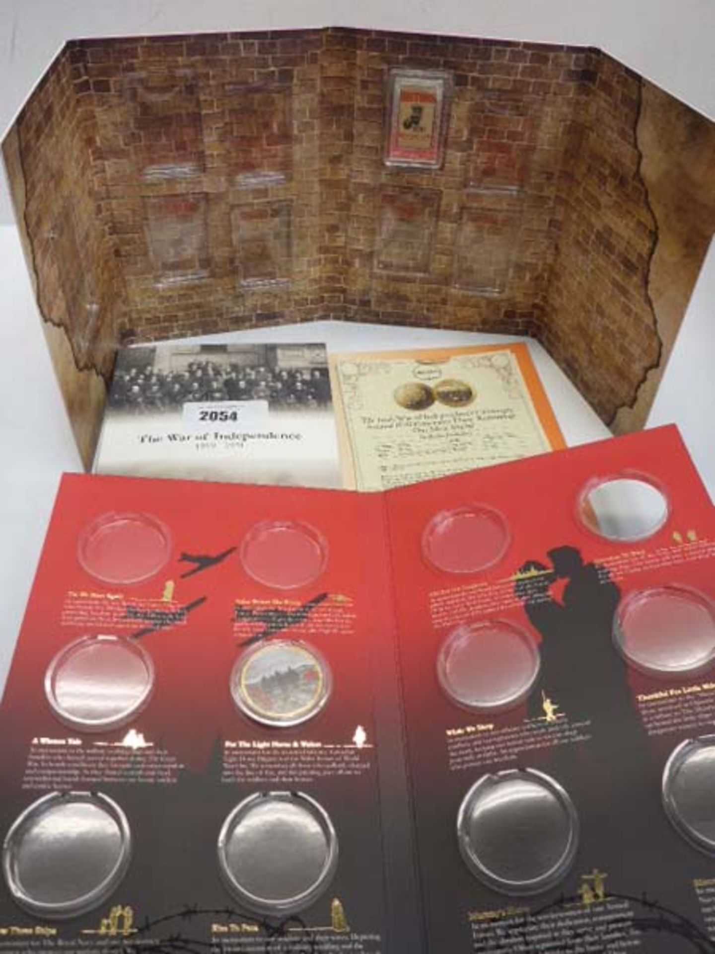 3 collectable coin folders for War of Independance, Posters of the First World War and War Poppy