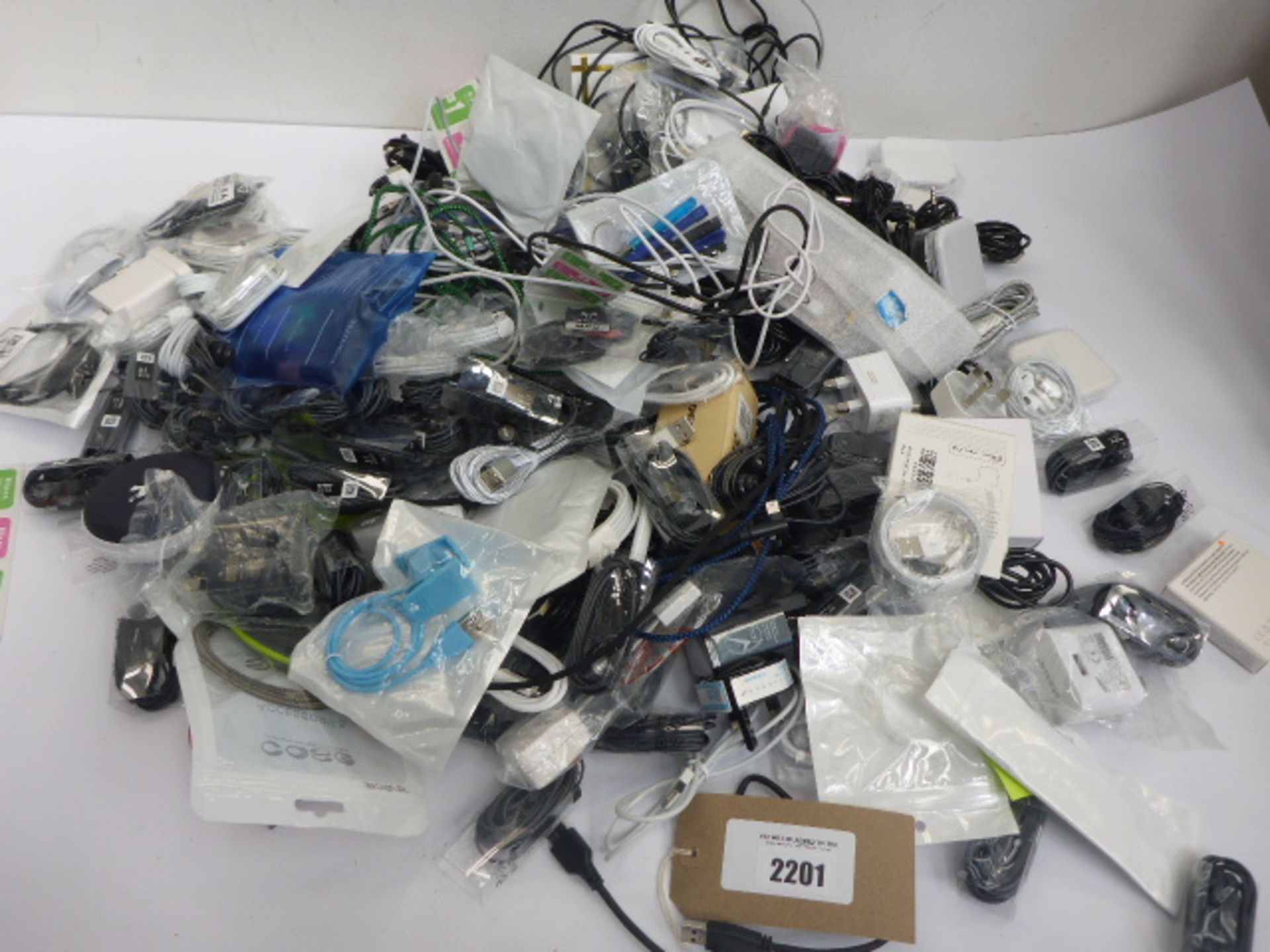 Bag containing quantity of mobile phone related accessories; cables, earphones, adapters, repair