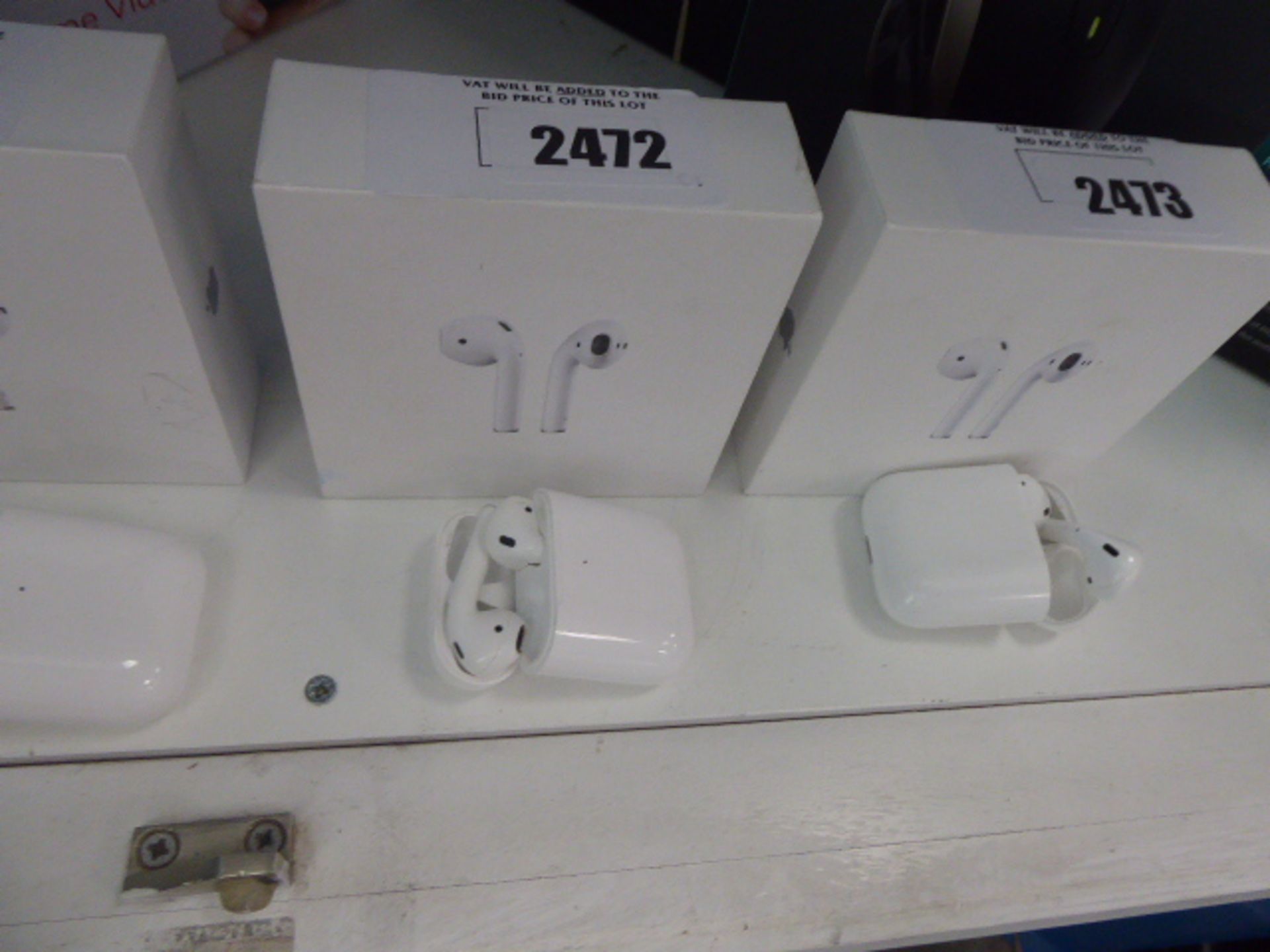 Apple air pods with charging case in box