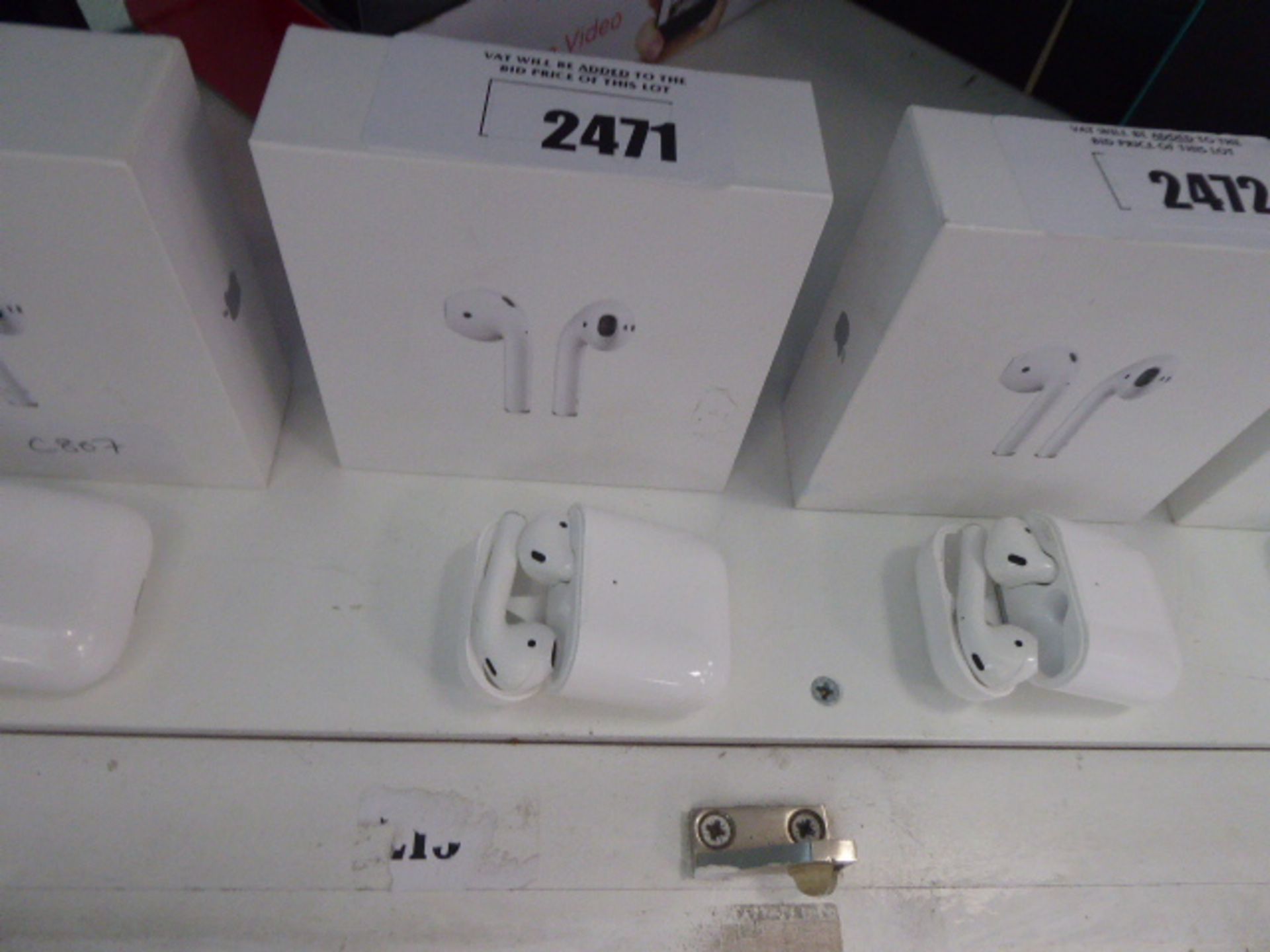 Apple air pods with charging case in box