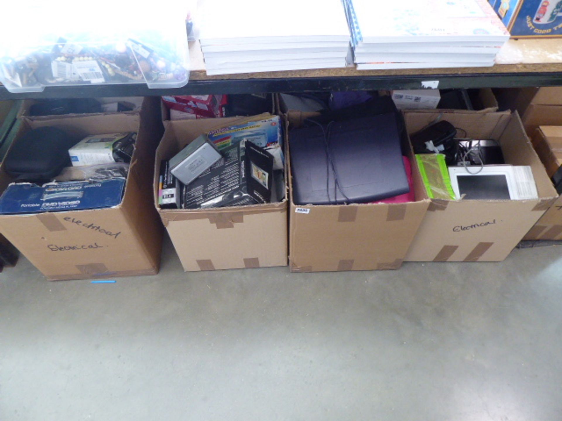8 boxes of mixed electrical items to incl. bluetooth speakers, SatNavs etc.