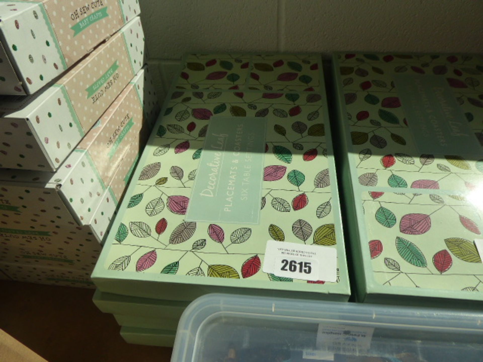 5 boxes of decorative leaf placemats and coasters for 6 place settings