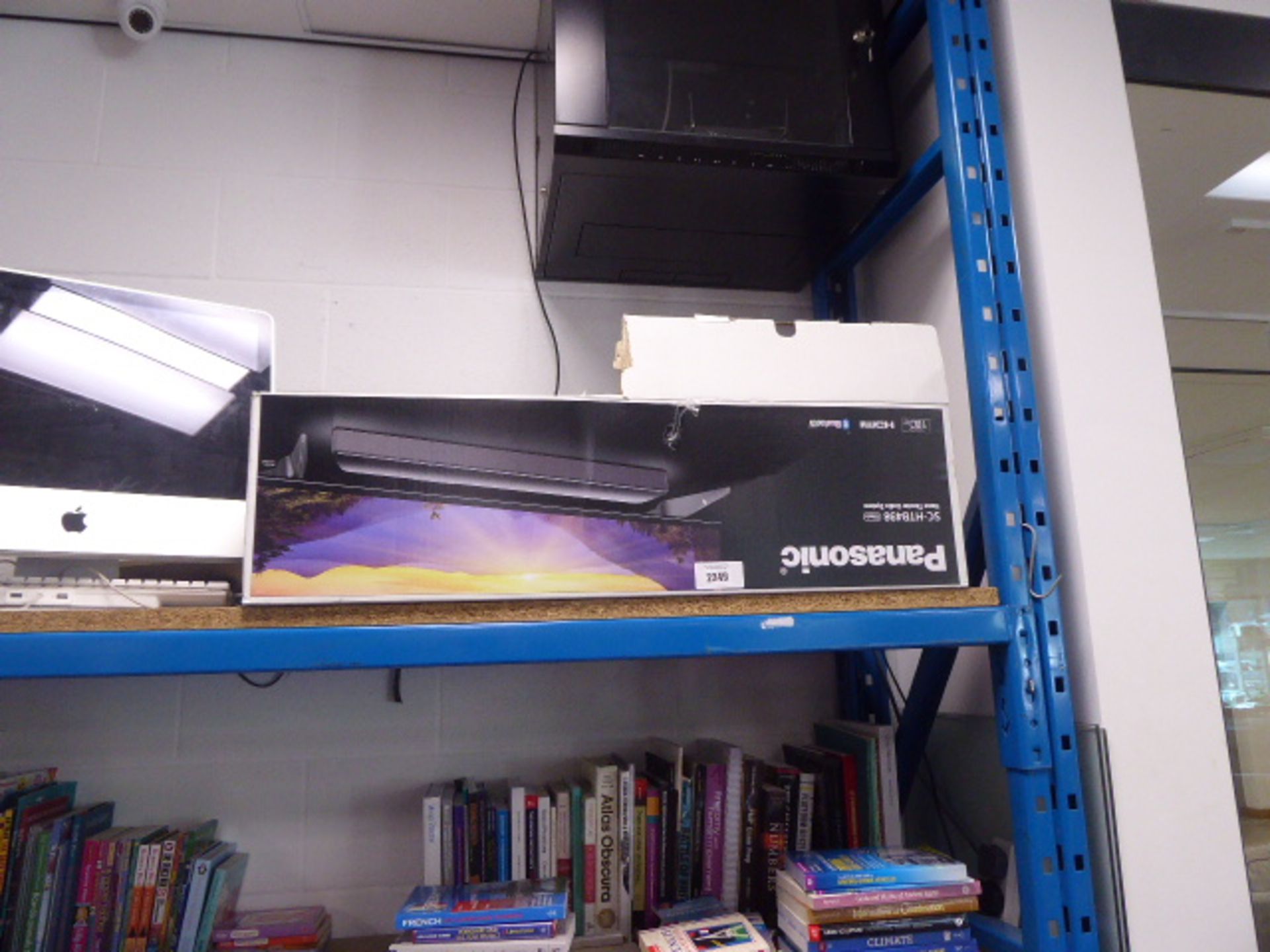 A Panasonic soundbar and wireless subwoofer in box model SC-HTB498