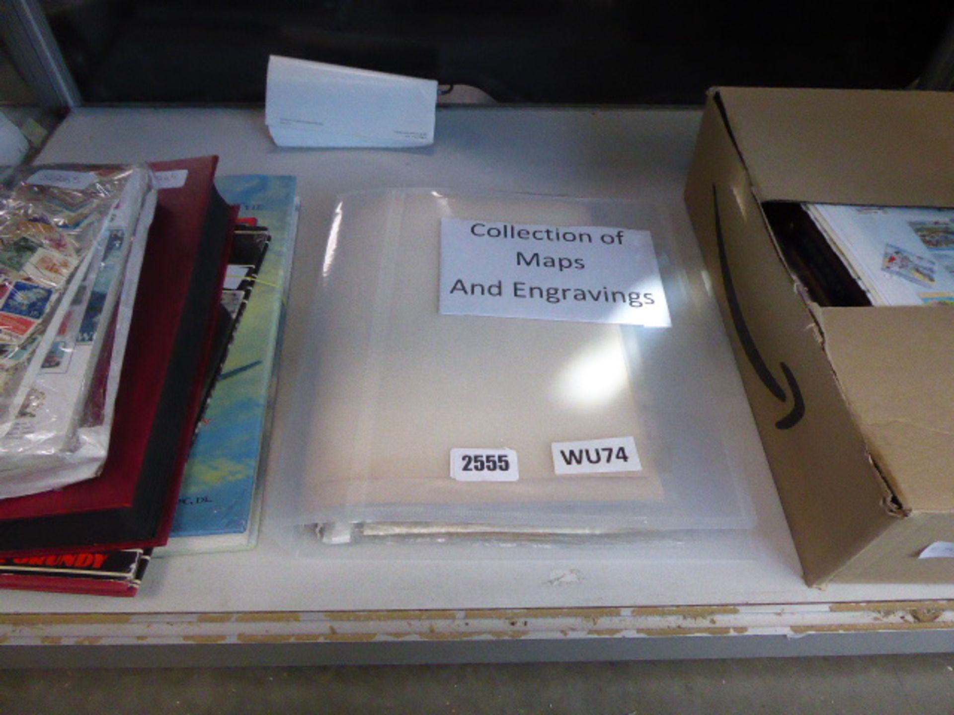 2548 Collection of maps and engravings in clear binder