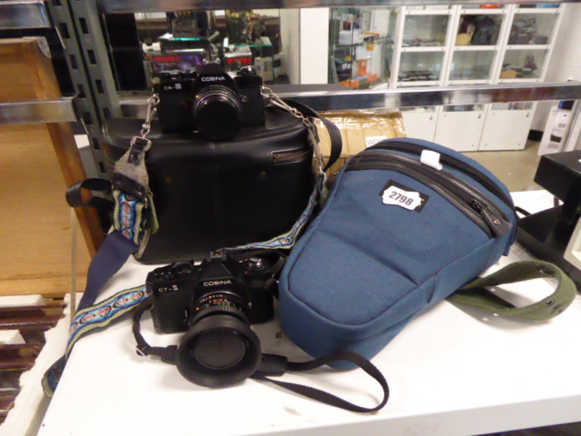 (2502) Cassina CT1 and CS2 cameras together with telephoto lens accessories.