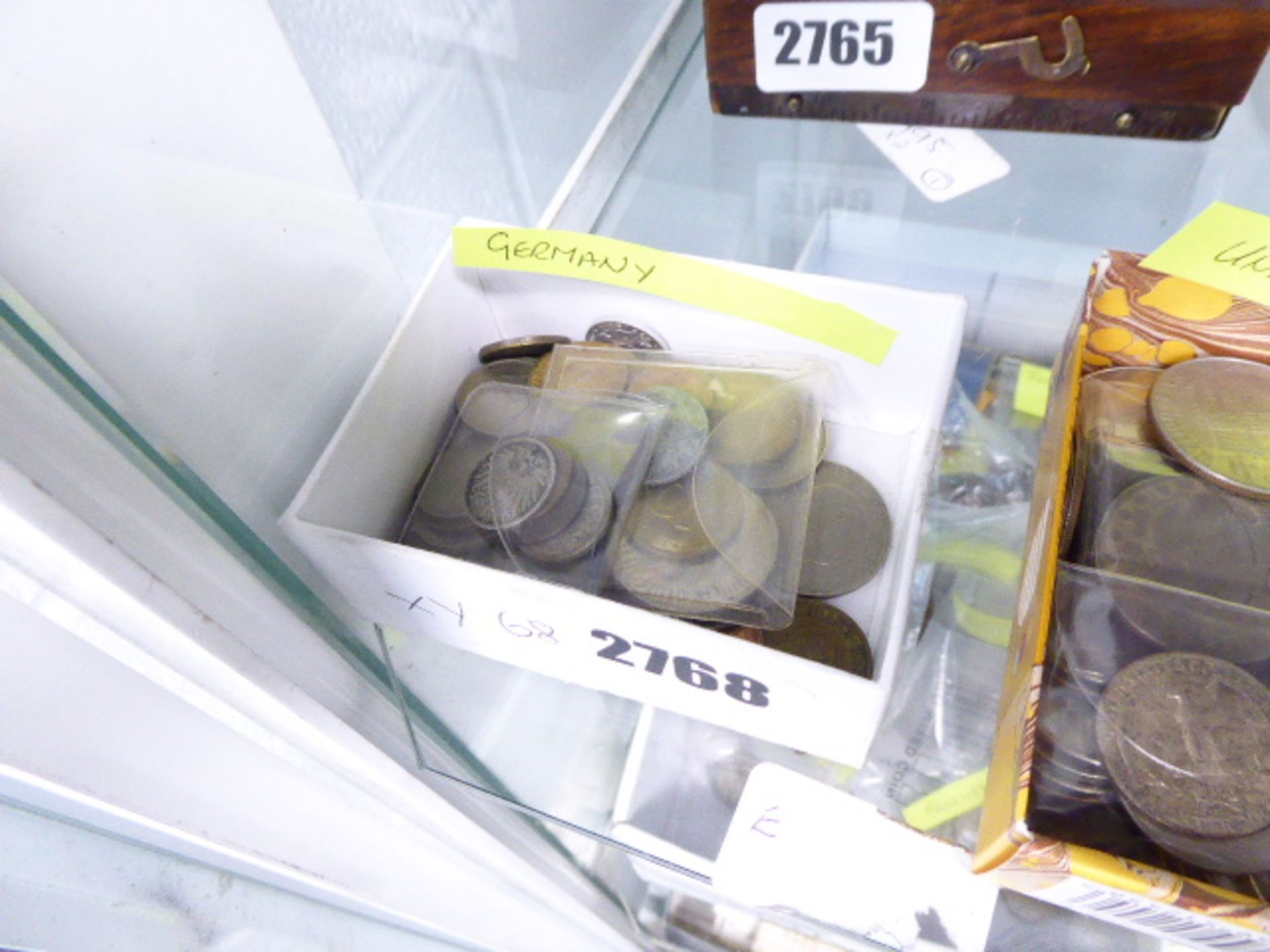 Selection of German coins in cardboard tray.