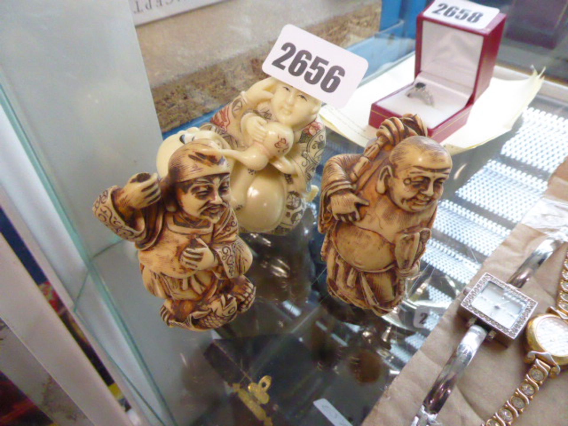 3 oriental style figures