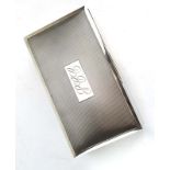 A mid-20th century silver engine turned cigarette box of rectangular form, maker H Bros.