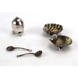 A pair of Victorian silver salts of shell form, with matching spoons, maker JW, Birmingham 1896,