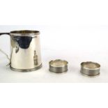 An Edwardian silver Christening mug of tapered form, Walker & Hall, Sheffield 1909, h.