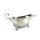 An Edwardian silver sauce boat of typical form, Birmingham 1906, 3.