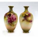 A pair of Royal Worcester vases of ovoid form,