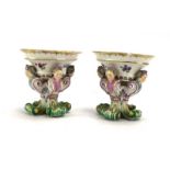 A pair of Meissen salts,