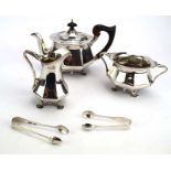 An Edwardian silver three piece bachelors' tea service of Art Nouveau design,