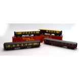 A group of Tri-ang OO gauge coaches including R228 Pullman 1st class,