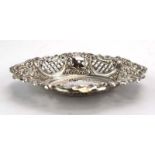 A stamped silver bon bon dish of oval form decorated in the Rococo manner, maker JR,