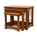 Robert 'Mouseman' Thompson of Kilburn, an oak nest of three occasional tables,